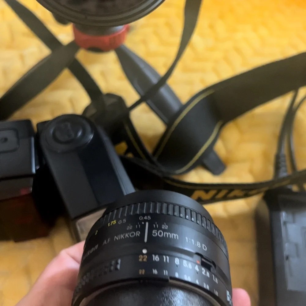 Nikon D90 with two lens and the flash